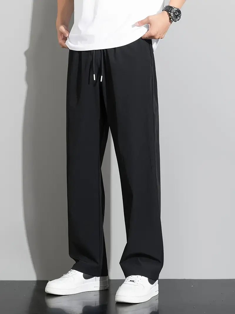 pantalon fluide noir avec coupe ample et confortable, idéal pour un look décontracté et élégant.